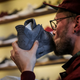 New KAWS x Air Jordan 4s buyer kisses his sneaker during the sale at Overkill store March 31, 2017, in Berlin. (Maja Hitij/Getty Images)